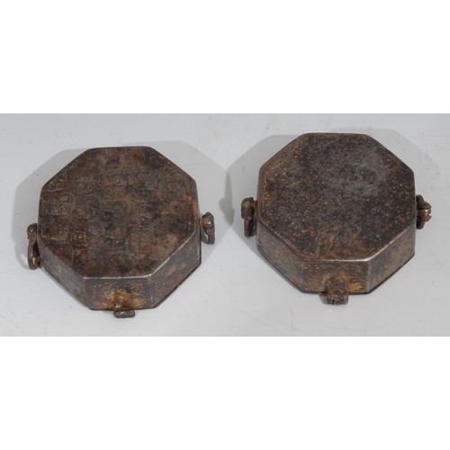 305 - A pair of 18th century Indian octagonal gold inlaid steel Betel lime boxes, decorated with styalised... 