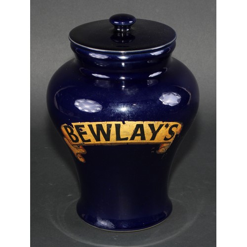 737 - A stoneware Bewlays inverted baluster tobacco or snuff jar and cover labeled in gilt on a cobalt blu... 