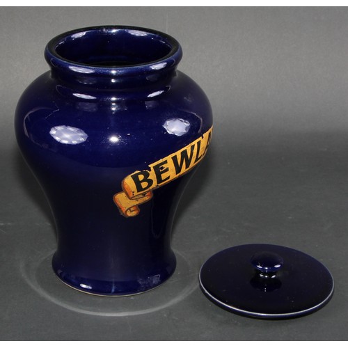 737 - A stoneware Bewlays inverted baluster tobacco or snuff jar and cover labeled in gilt on a cobalt blu... 