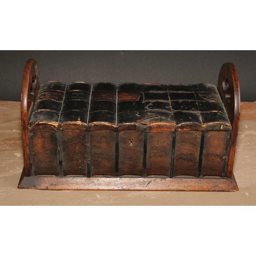 269 - A late 19th/early 20th century novelty oak cigar box, as a folding book rack with seven leather boun... 