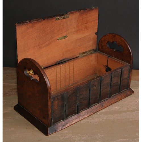 269 - A late 19th/early 20th century novelty oak cigar box, as a folding book rack with seven leather boun... 