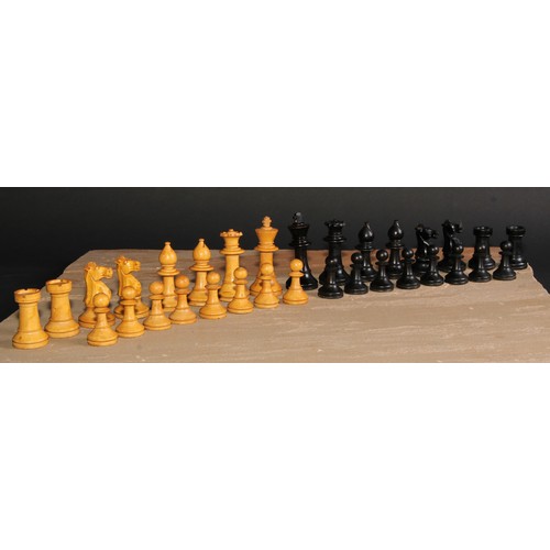 122 - A boxwood and ebonised Staunton pattern chess set, the Kings 9cm high