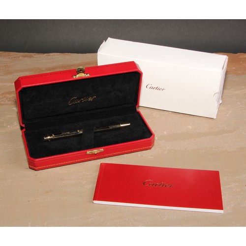 586 - Horse Racing Interest - a Must De Cartier ball point pen, engraved with the name of the celebrated r... 