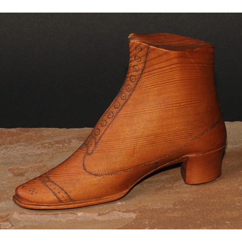 91 - A 19th century pine novelty, carved as a boot, 14.5cm long