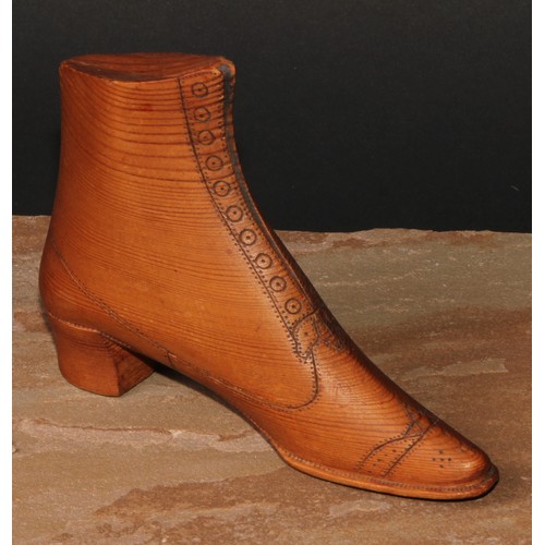 91 - A 19th century pine novelty, carved as a boot, 14.5cm long