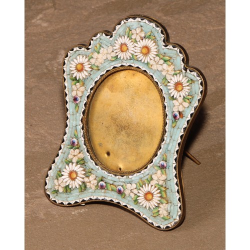 499 - An Italian micromosaic easel photograph frame, decorated in polychrome tesserae with flowers, 9cm lo... 