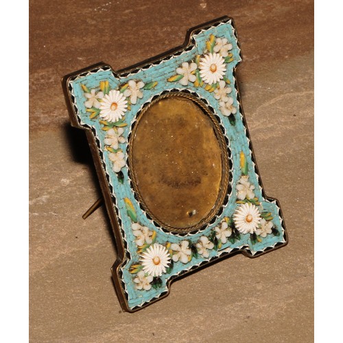 499 - An Italian micromosaic easel photograph frame, decorated in polychrome tesserae with flowers, 9cm lo... 