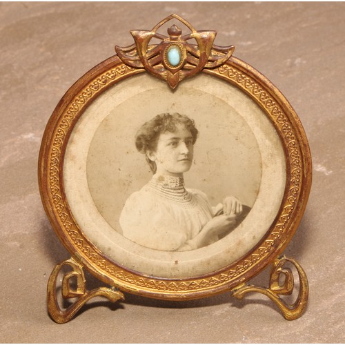 435 - An Art Nouveau turquoise mounted gilt metal easel photograph frame, 9cm high, c.1905; others (3)