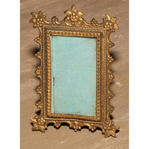 435 - An Art Nouveau turquoise mounted gilt metal easel photograph frame, 9cm high, c.1905; others (3)