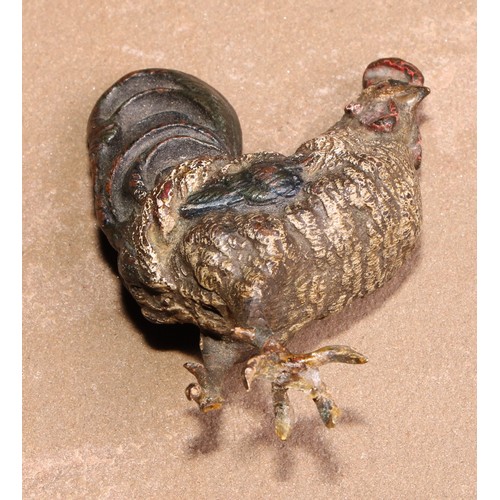 444 - An Austrian cold painted bronze, of a cockerel, 6cm high, Vienna, c.1910; another, of a hen (2)