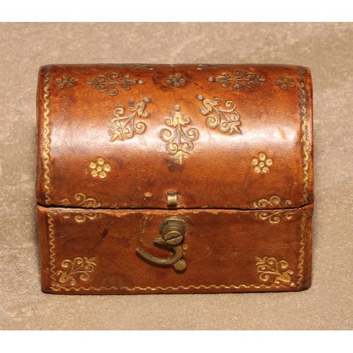 105 - A 19th century tooled and gilt leather domed rectangular miniature casket, hinged cover, 4.5cm wide;... 