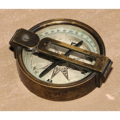 726 - An early 20th century brass compass, silvered dial, 6cm diam