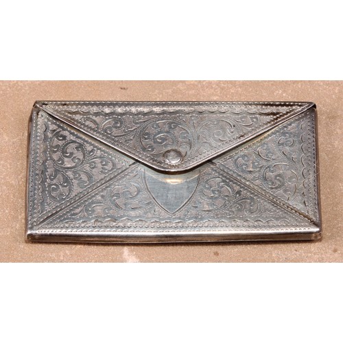 480 - An Edwardian silver novelty visiting card case, as an envelope, bright-cut engraved with scrolling f... 