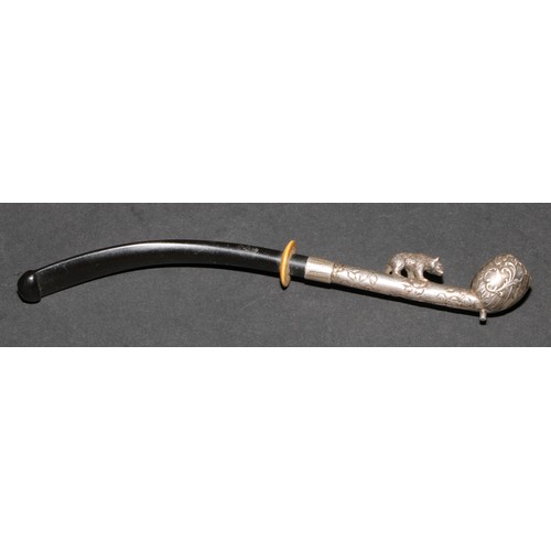 462 - An early 20th century silver coloured metal pipe or cheroot holder, the stem surmounted by a bear, 1... 