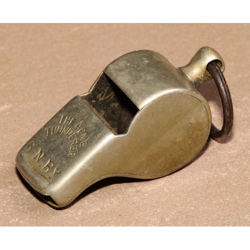 877 - A Hudson's patent whistle, The ACME Thunderer, stamped G.N.Ry [Great Northern Railway], 6cm long; an... 