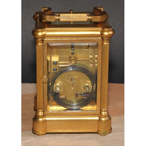 698 - A late 19th century French gilt brass repeater carriage clock, 5.5cm circular enamel inscribed with ... 