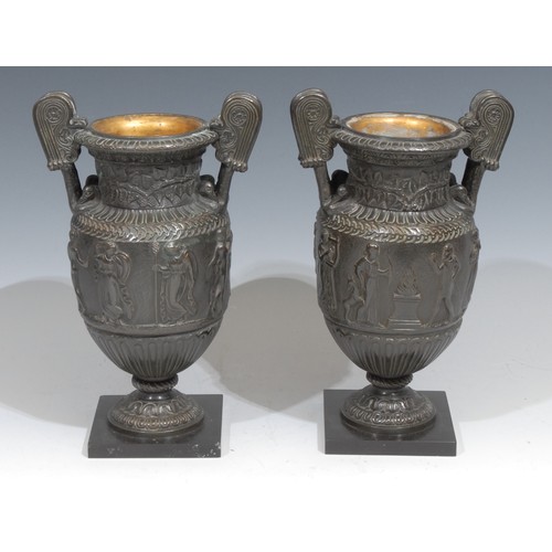 312 - A pair of 19th century Grand Tour bronze urns, after Ancient Greek volute kraters, cast in bas relie... 