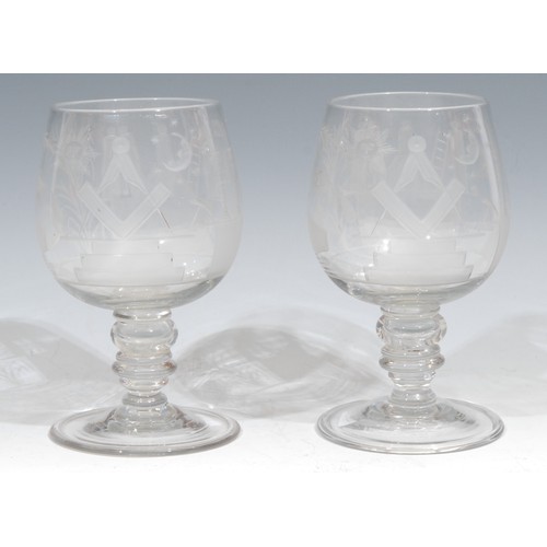 560 - Freemasonry & Friendly Society Interest - a pair of 19th century drinking glasses, each profusely et... 