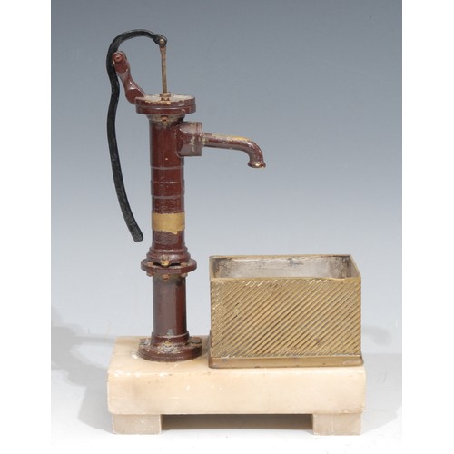 247 - A l9th/early 20th century painted and polished brass scratch built model, of a water pump and trough... 