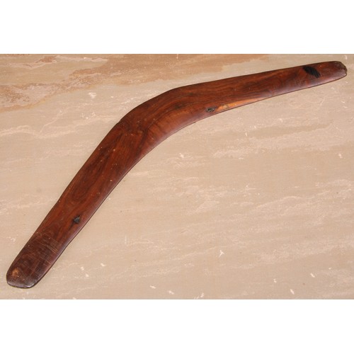 824 - An Australian Aboriginal boomerang, 58.5cm long, early 20th century