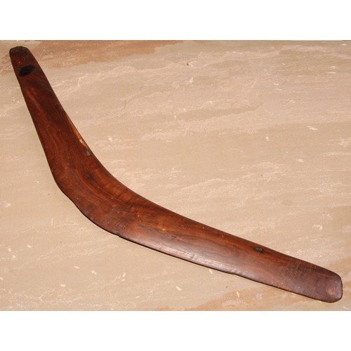 824 - An Australian Aboriginal boomerang, 58.5cm long, early 20th century