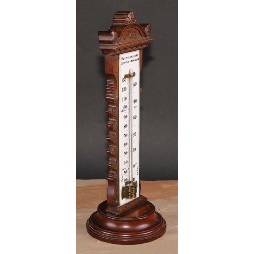 250 - A large and unusual Victorian walnut table top thermometer, the opaque glass register inscribed Wood... 