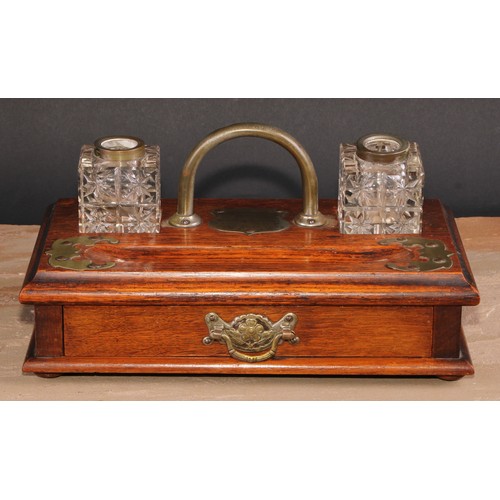 562 - Freemasonry & Friendly Society Interest - an Edwardian oak rectangular inkstand, arched carrying han... 