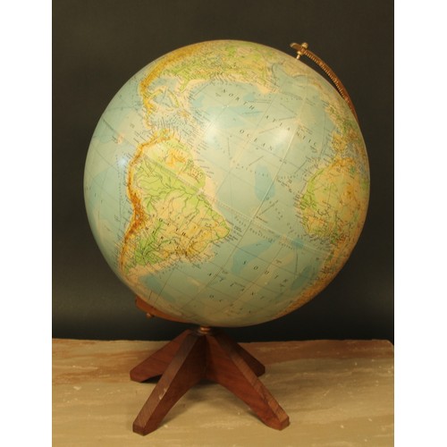 9 - A 13” terrestrial Worldmaster globe, by George Phillip & Son Ltd, London, gilt horizon ring, hardwoo... 