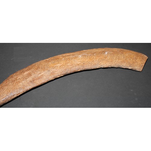 830 - Tribal Art - a hardwood club, of Australian Aboriginal leangle type, curved blade, 103cm long