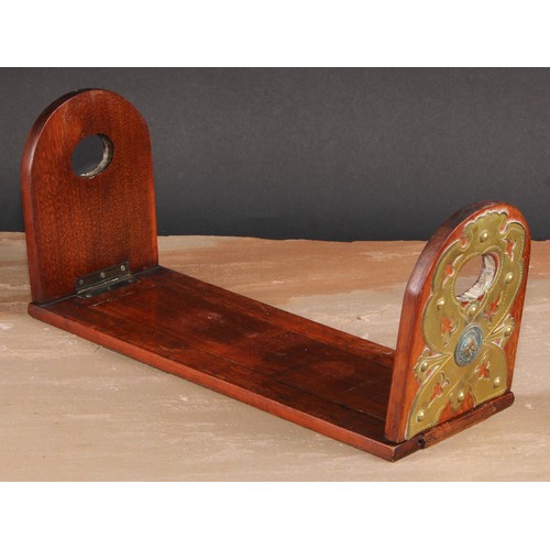 399 - A Victorian walnut bookslide, arched folding end supports, each applied with gilt brass cut-card wor... 