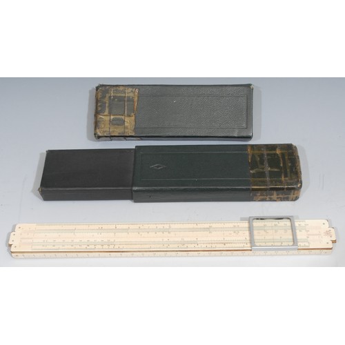 715 - A Fowler's Textile Calculator, short scale type, 9cm over loop, cased; slide rules, various manufact... 