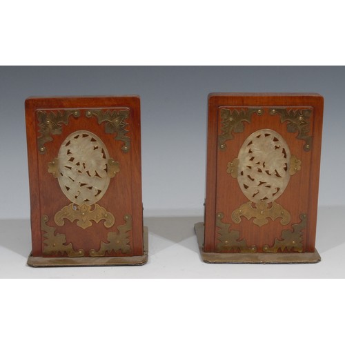 322 - A pair of Chinese jade mounted hardwood bookends, applied in brass cut-card work with bats, 16cm hig... 