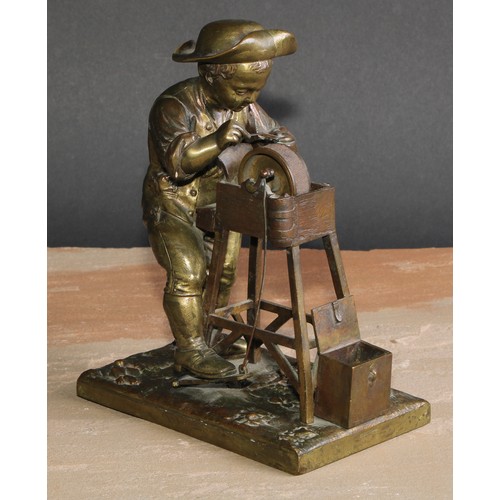 502 - An unusual 19th century French bronze automaton table vesta, as a young knife grinder, his wheel wit... 