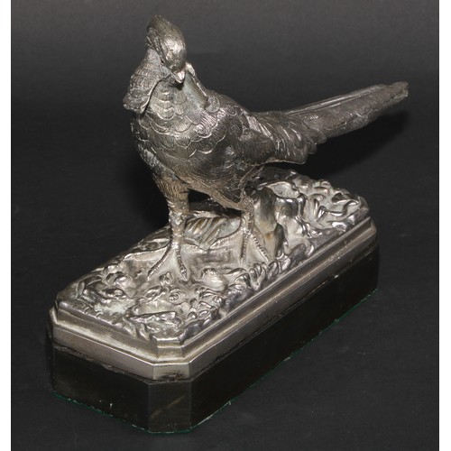 531 - Continental School (first-half 20th century), a silvered bronze, of a pheasant, canted black marble ... 