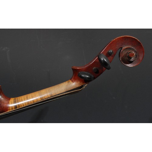 758 - A violin, the one-piece back 33cm long excluding button, paper label printed Dulcis et Fortis J.T.L,... 