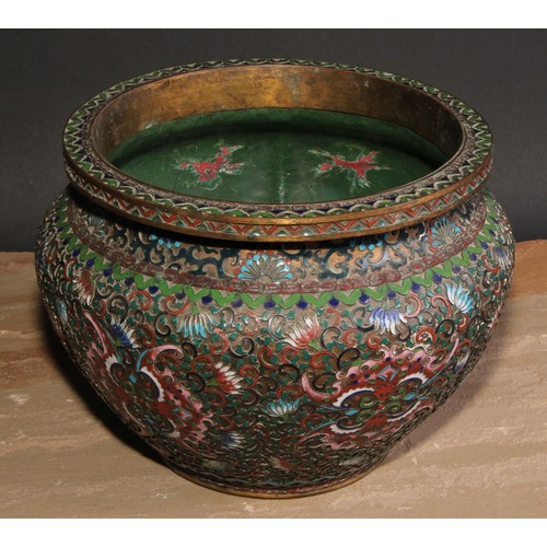 146 - A Chinese cloisonne champlevé enamelled lobed ovoid jardiniere, the base enamelled in green with cha... 