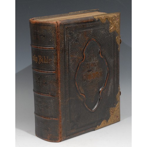 23 - A 19th century brass mounted tooled and gilt morocco leather family Bible, 33cm high