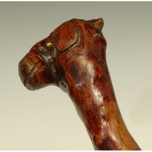 743 - A 19th century folk art walking stick, the pommel carved as the head of a gentleman and a farm anima... 