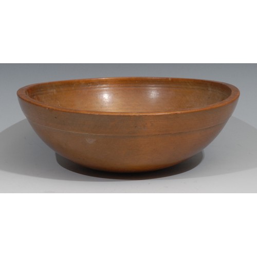 30 - A 19th century turned treen dairy bowl, 24cm in diameter, c.1850