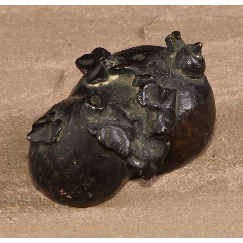 144 - A Chinese bronze water dropper, cast as a gourd shaped fruit surmounted by a snail, 6cm long