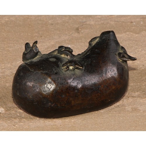 144 - A Chinese bronze water dropper, cast as a gourd shaped fruit surmounted by a snail, 6cm long