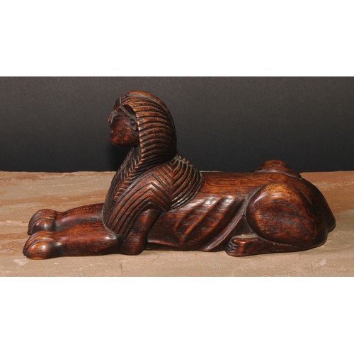 82 - A 19th century oak carving of a Sphinx, after the Ancient Egyptian and in the Grand Tour taste, 27cm... 