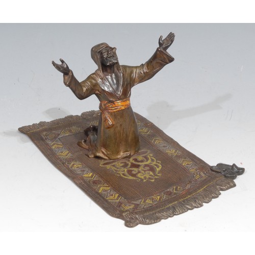 509 - Austrian School (19th/early 20th century), an Orientalist cold painted bronze, of a Muslim Arab, in ... 