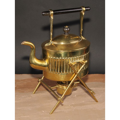 694 - An Arts & Crafts brass spirit kettle, ebony handle and finial, William Soutter & Sons, 34cm high; an... 