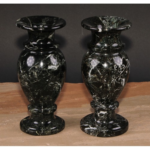 323 - A pair of composite marble pedestal baluster vases, 20cm high