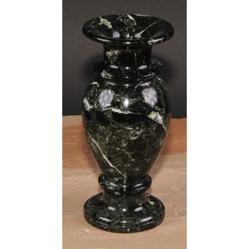 323 - A pair of composite marble pedestal baluster vases, 20cm high