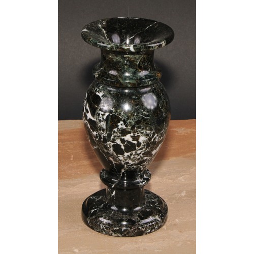 323 - A pair of composite marble pedestal baluster vases, 20cm high