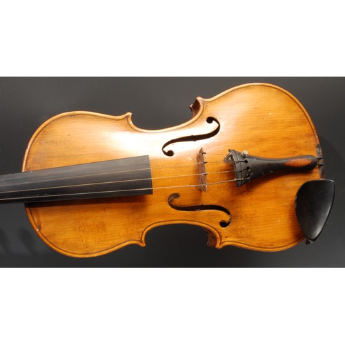 401 - A violin, the two-piece back 35.75cm long excluding button, ebonised tuning pegs, outlined throughou... 