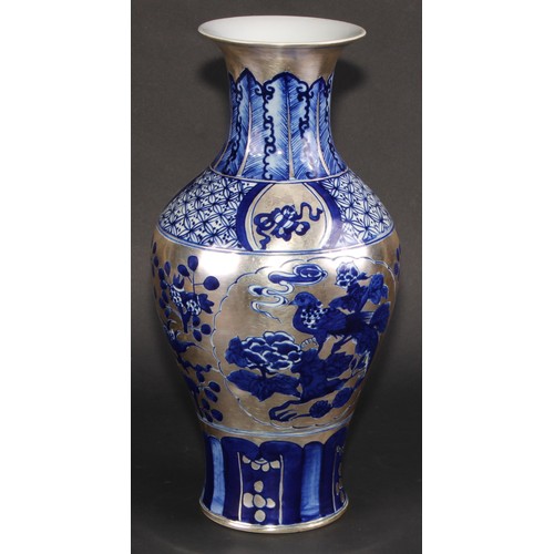 137 - A Chinese baluster vase, decorated in silver lustre and underglaze blue with flowers, clouds and pre... 