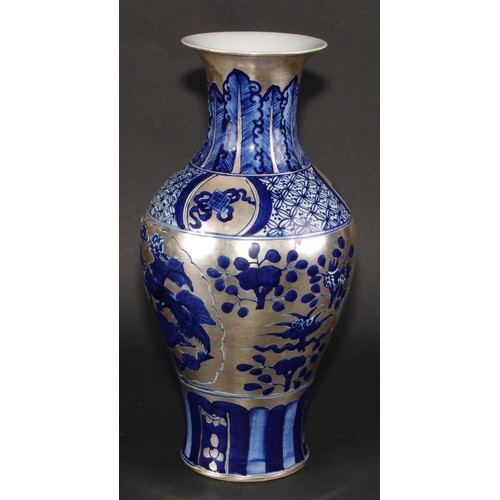 137 - A Chinese baluster vase, decorated in silver lustre and underglaze blue with flowers, clouds and pre... 